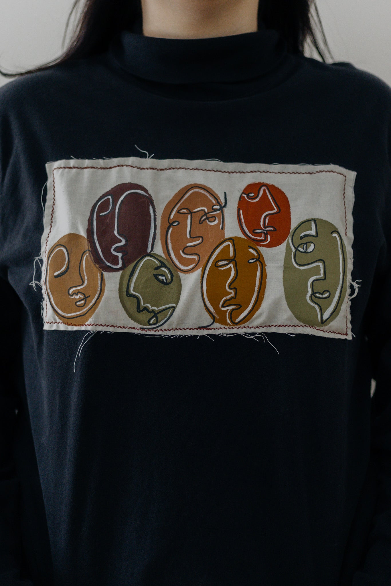 Circle Face Turtleneck