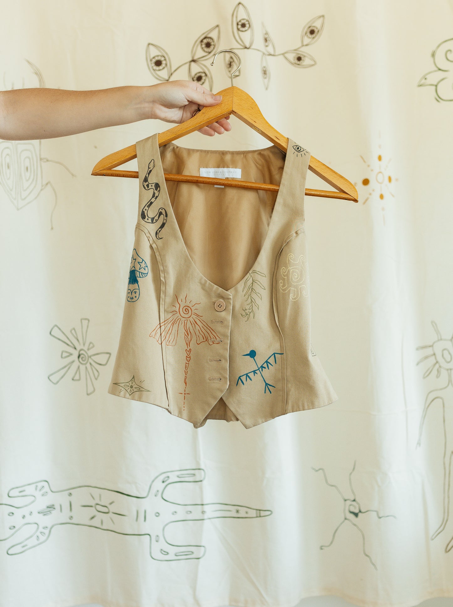 Tan vest - Earth in Outlines