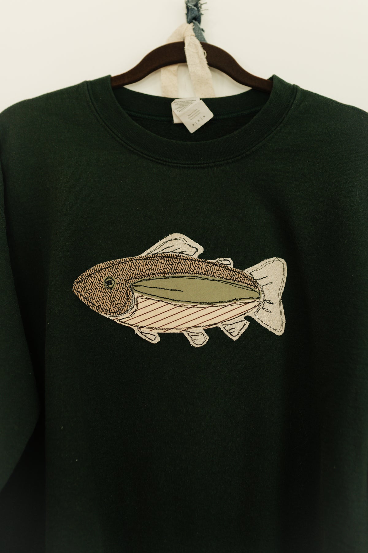 Fish patched green crewneck