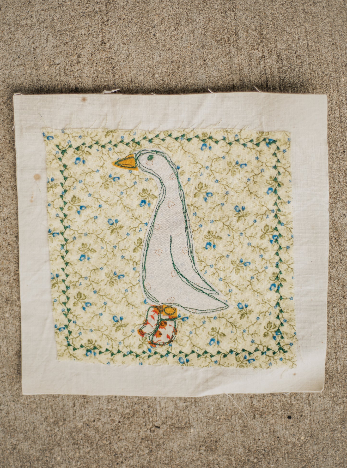 Goose in orange flower boots patch