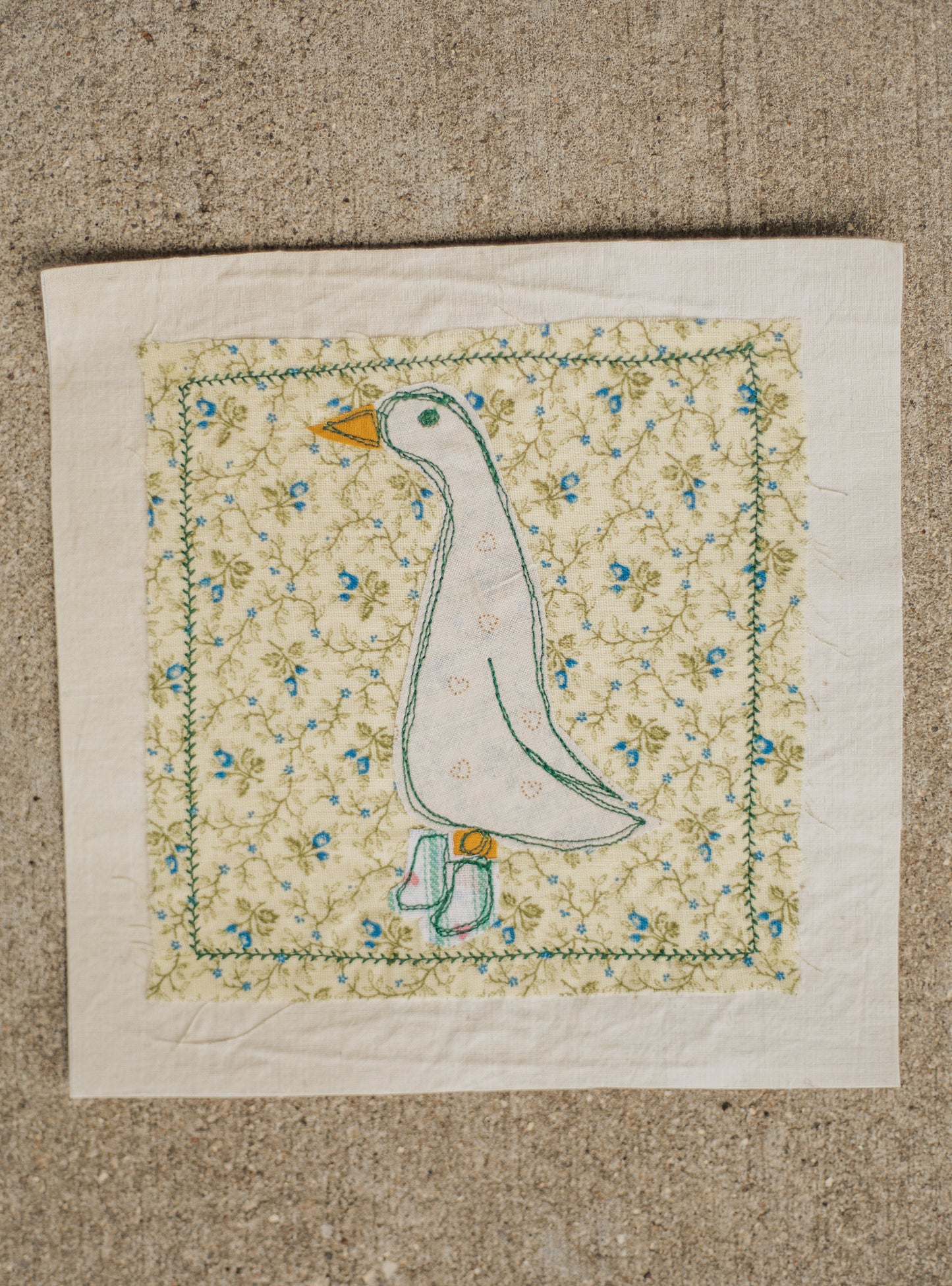 Goose in green striped boots patch