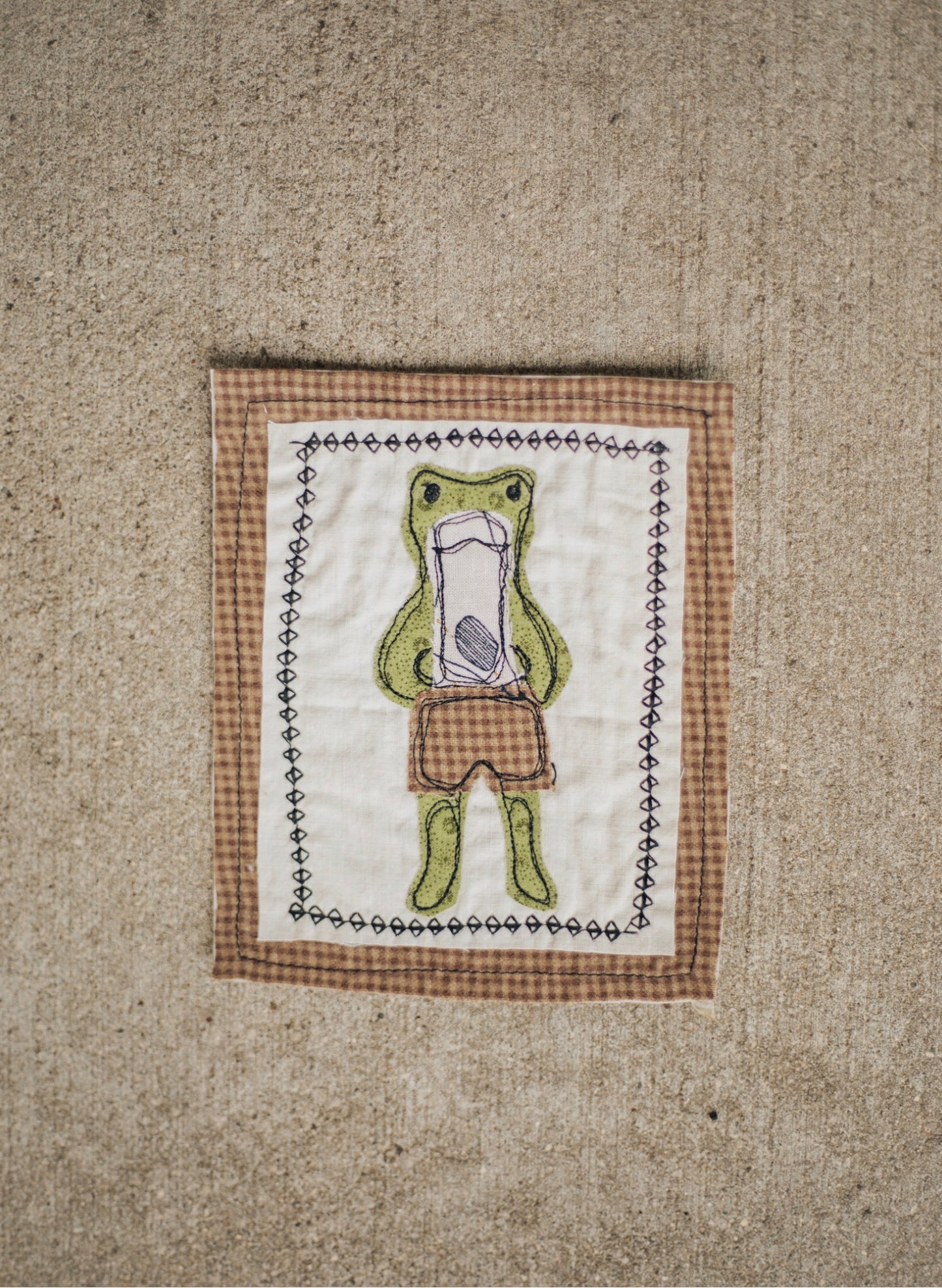 Frog in brown checkered boxers patch