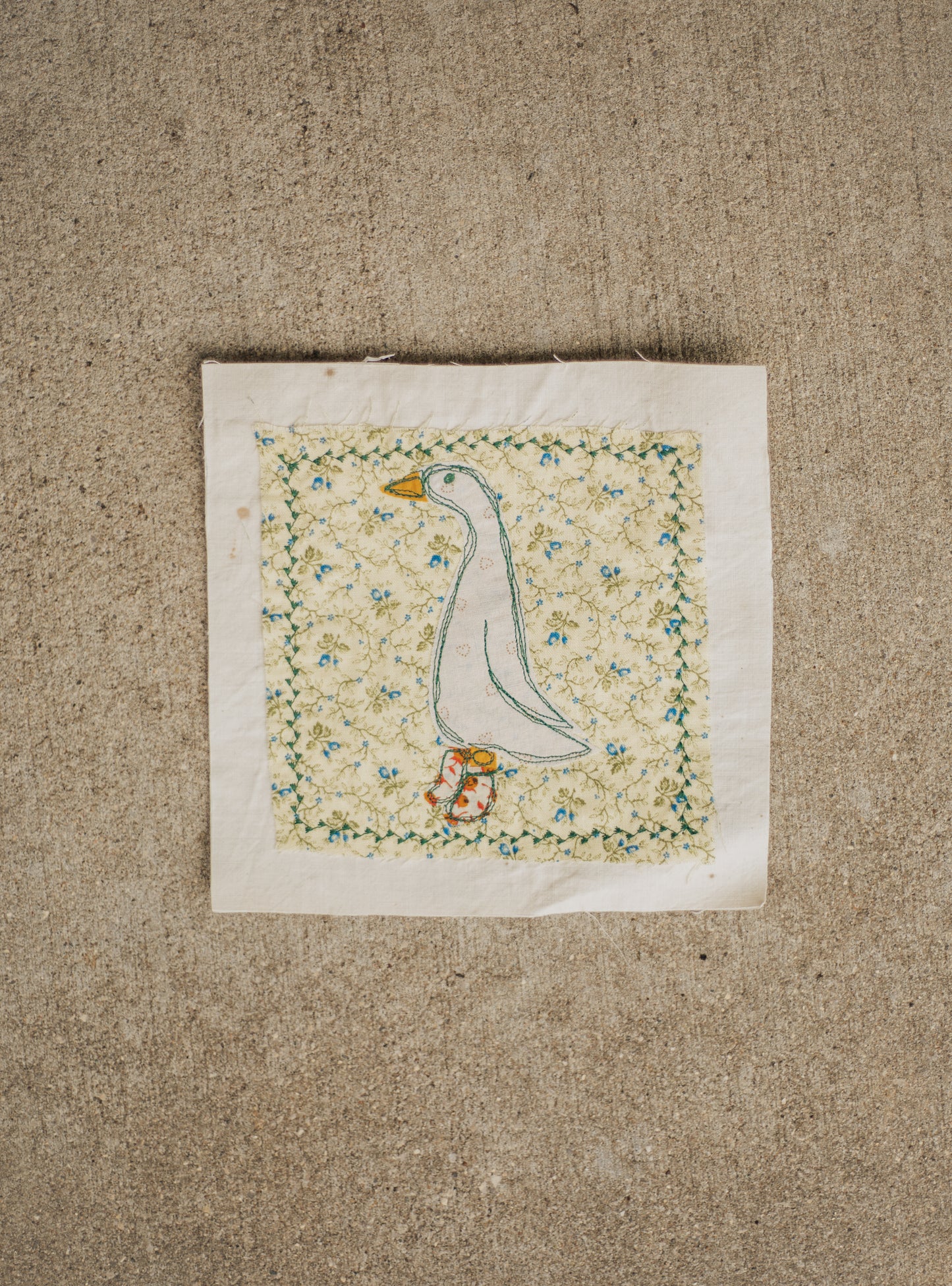 Goose in orange flower boots patch