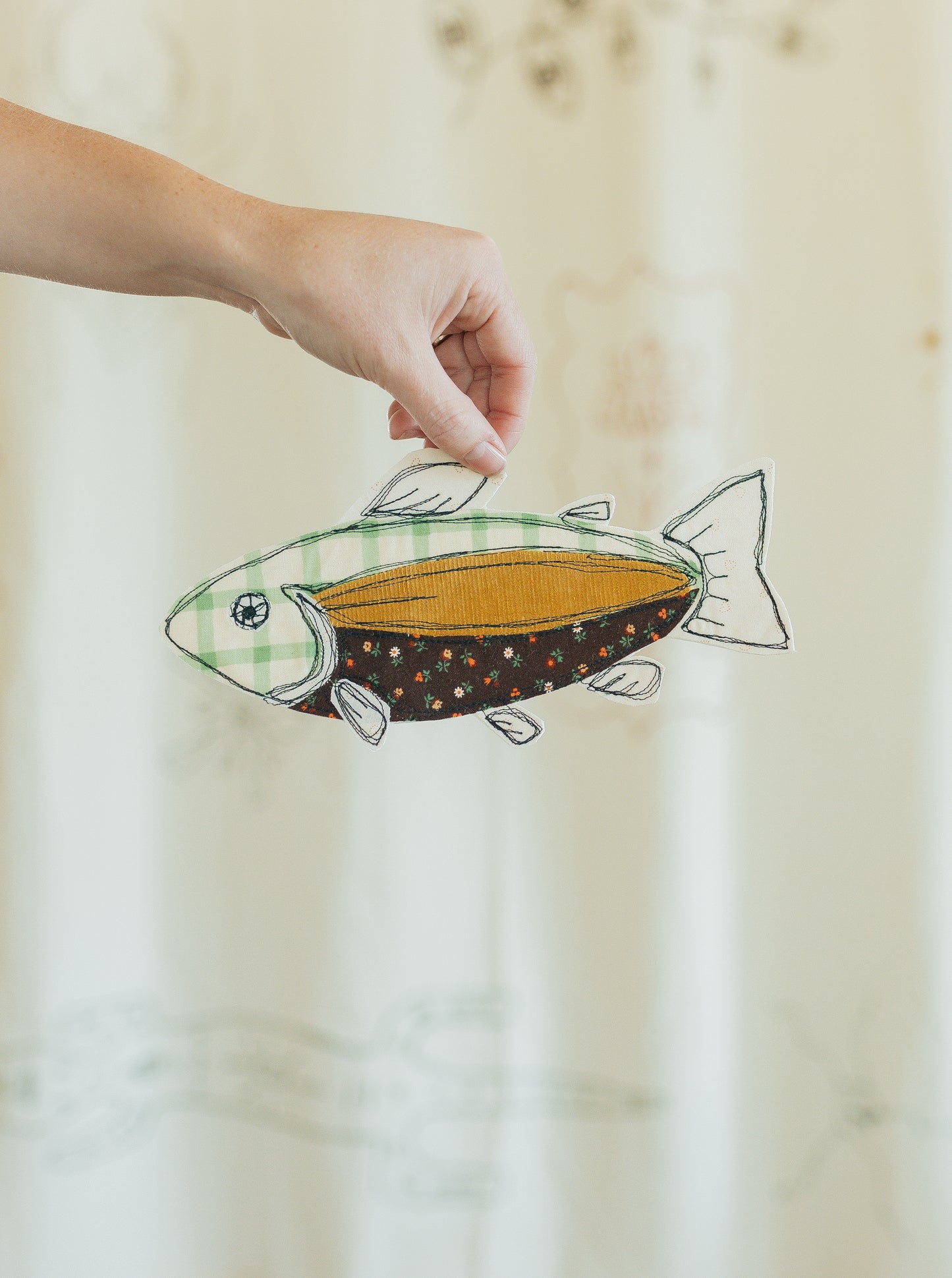 Green checkered fish patch