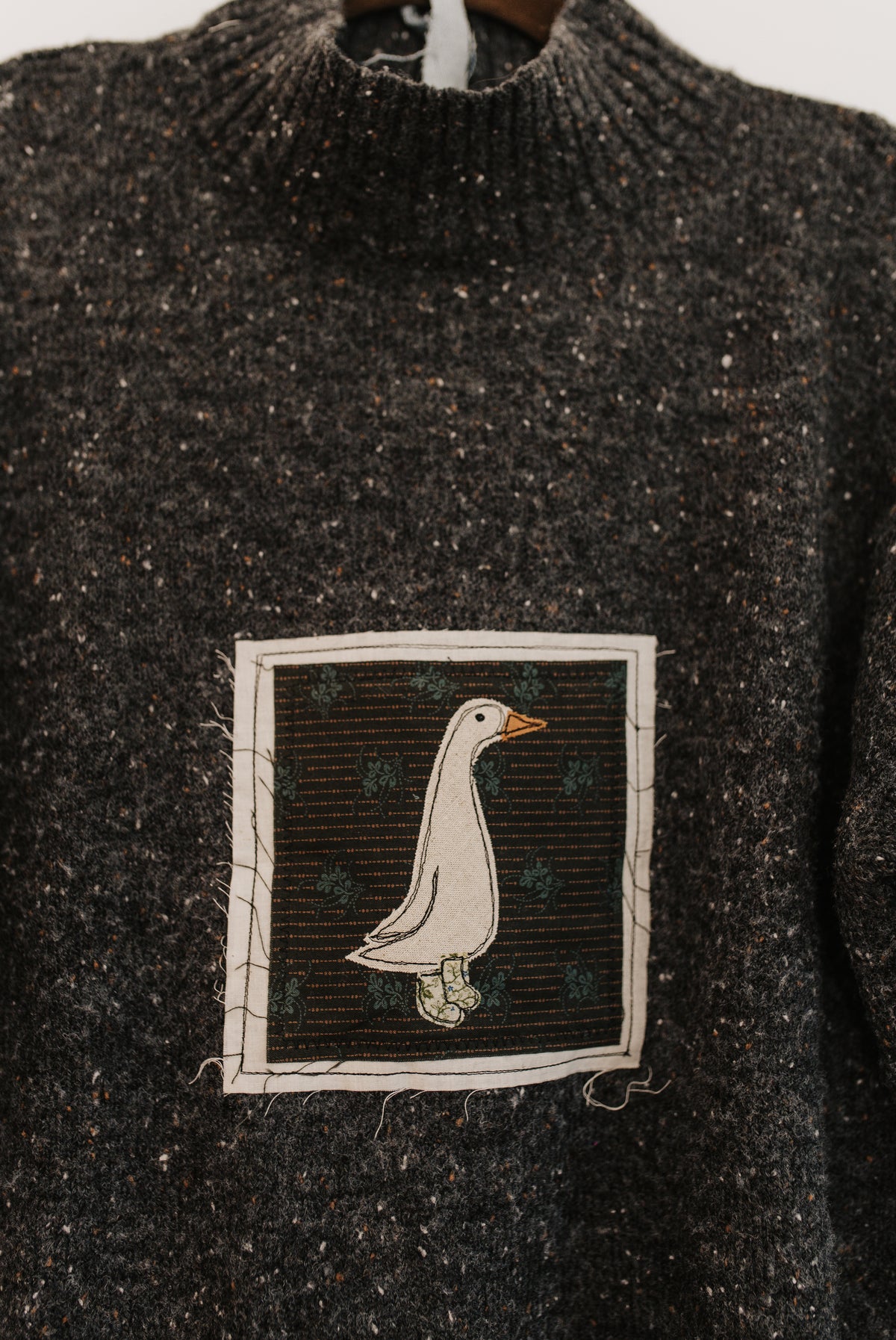 Goose Patched Grey Sweater