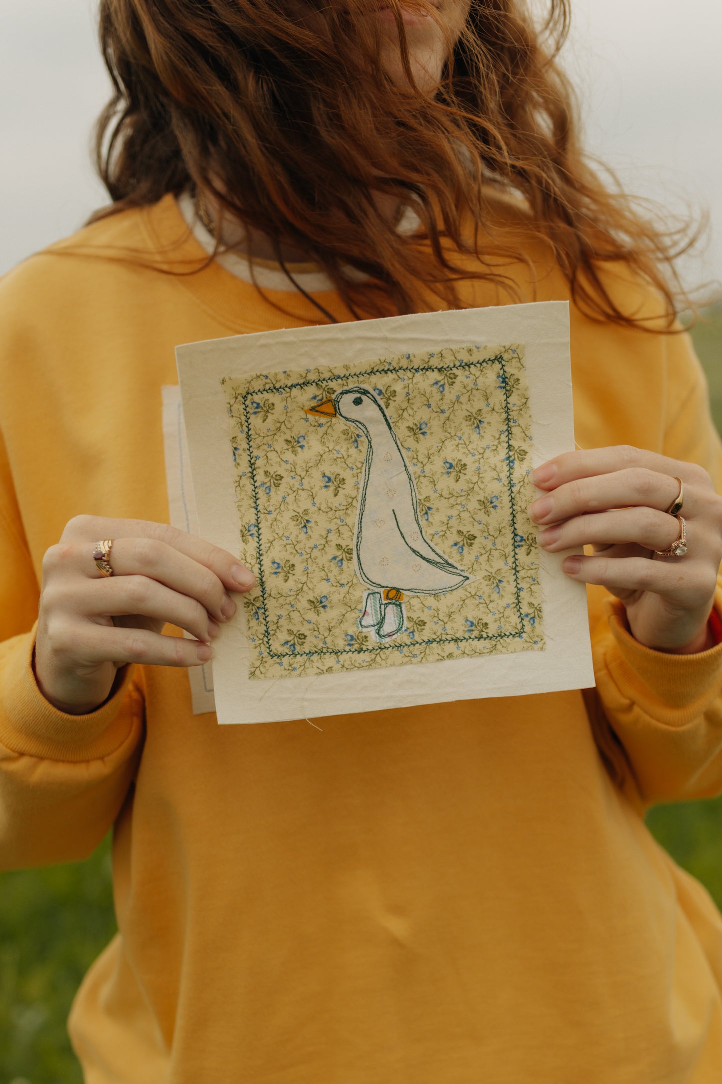 Goose in green striped boots patch