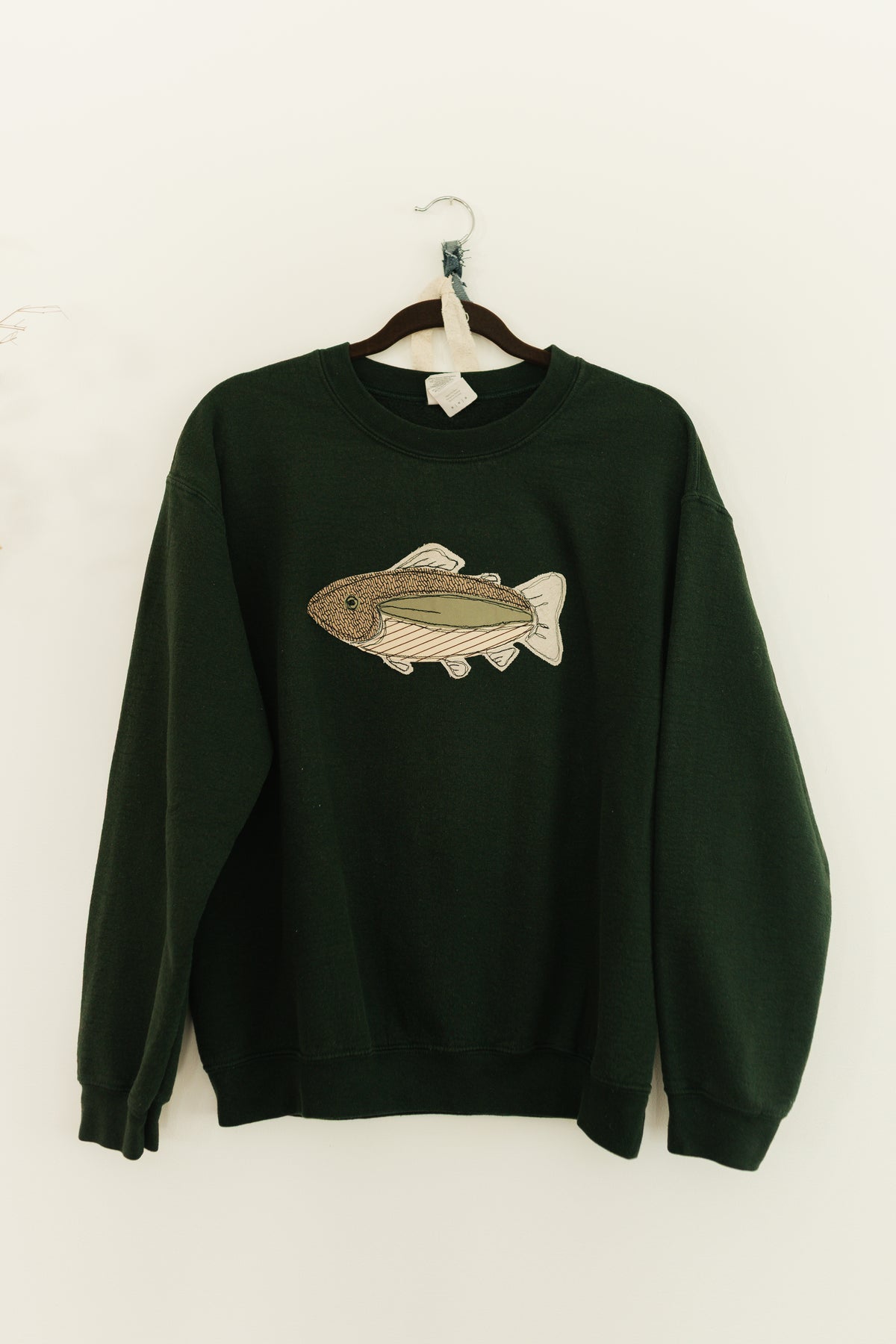 Fish patched green crewneck