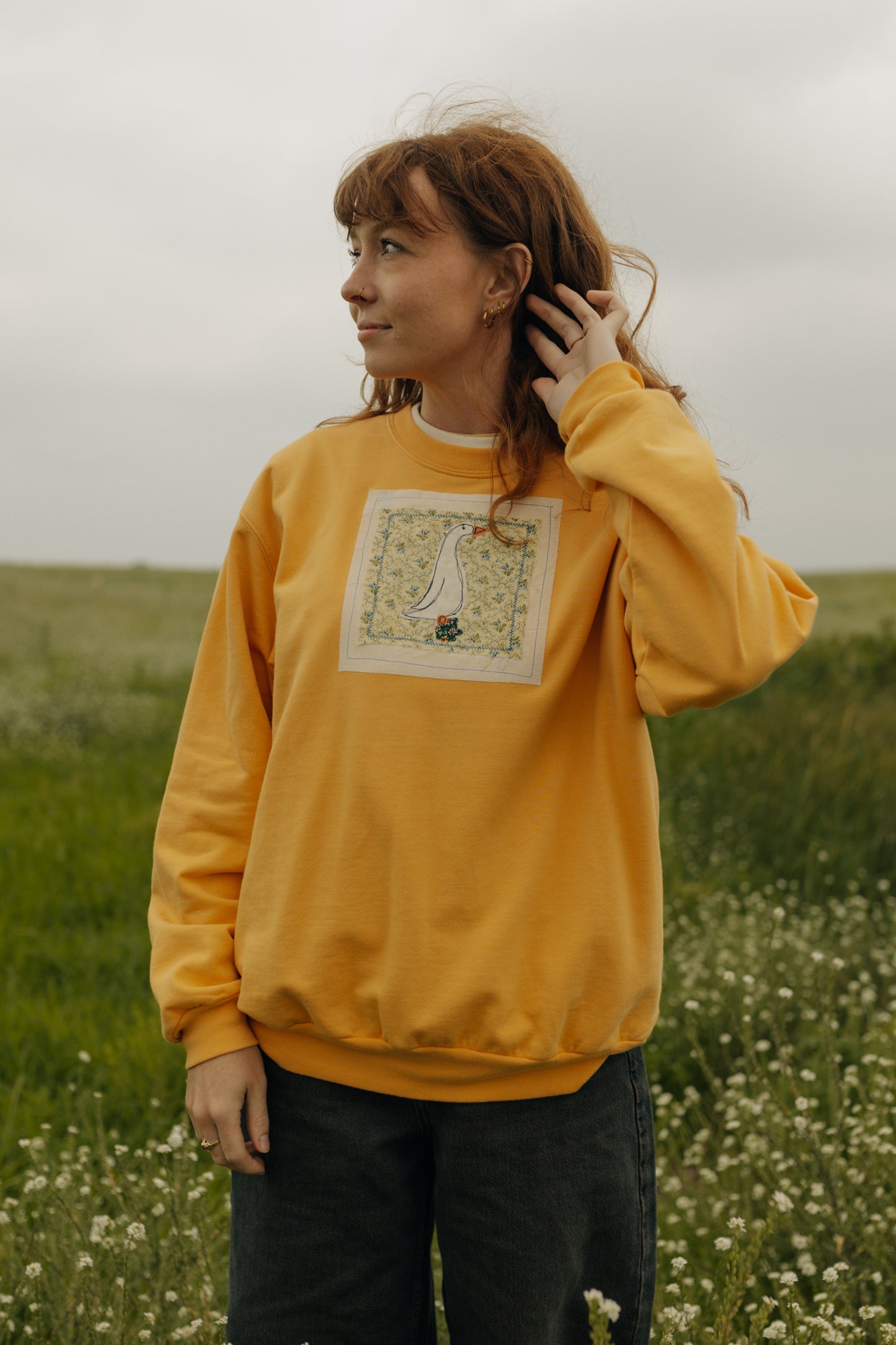 Goose patched crewneck