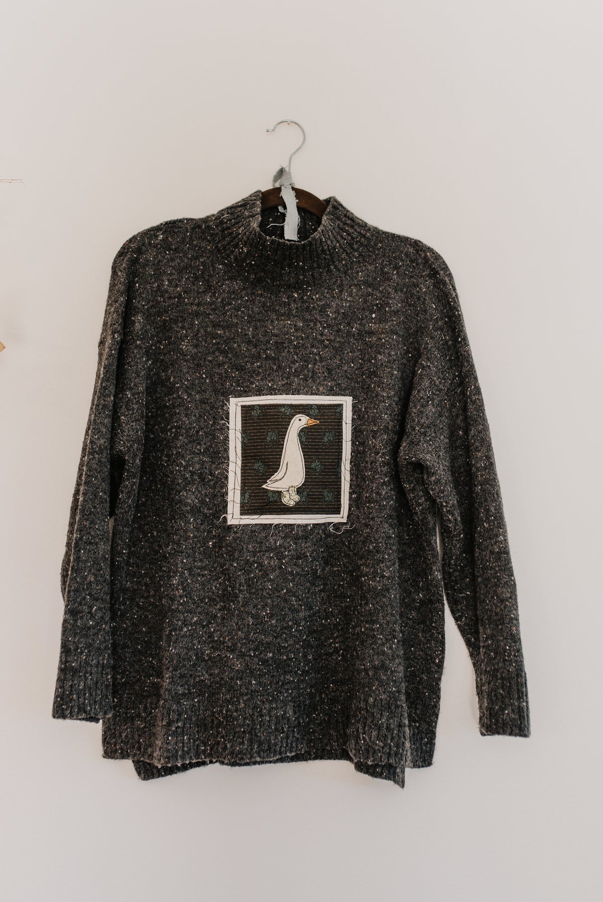 Goose Patched Grey Sweater