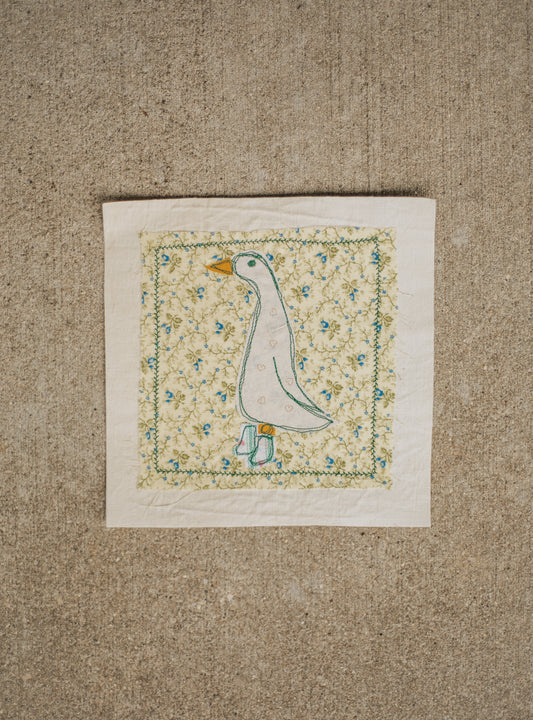 Goose in green striped boots patch
