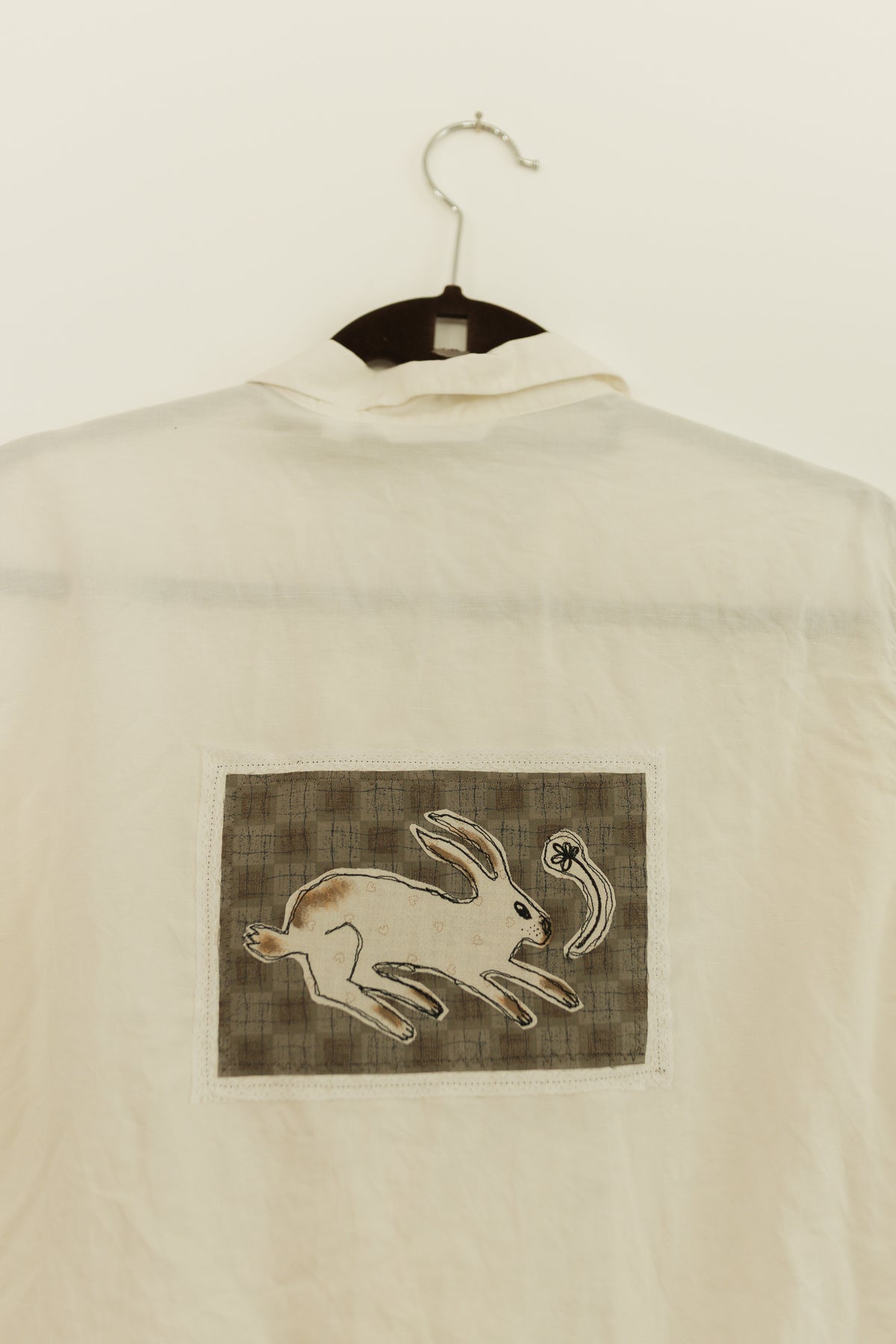 White bunny patched button up